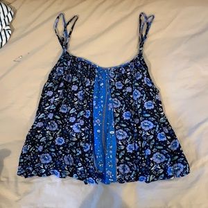 Bus and black flower bouncy tank top